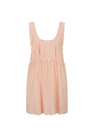 A light peach-pink sleeveless babydoll dress with a scoop neckline, delicate lace trim along the armholes and waist, and a scalloped hem, shown against a plain white background.