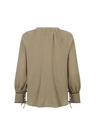 A long-sleeve blouse with a small-scale beige and brown gingham pattern, featuring a gathered neckline and tie details at the cuffs, shown against a plain white background.