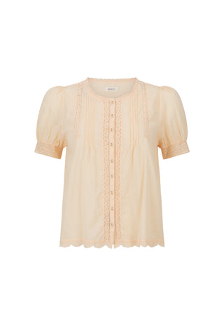 A pale peach short-sleeve blouse with puff sleeves, a round neckline, and vertical lace trim with a button placket, shown on a plain white background.