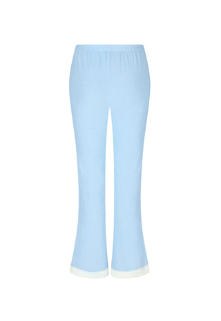 Light blue cropped flare pants with a white contrast trim at the hem, shown against a plain white background.
